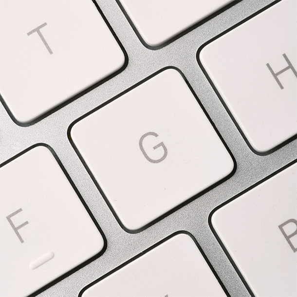 Close up of a keyboard, showing the F and G keys in the center